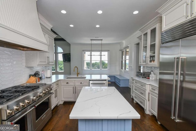 2771 Point Overlook, Gainesville, GA 30501 - kitchen featuring sink, white cabinets, premium appliances, a center island, and kitchen peninsula