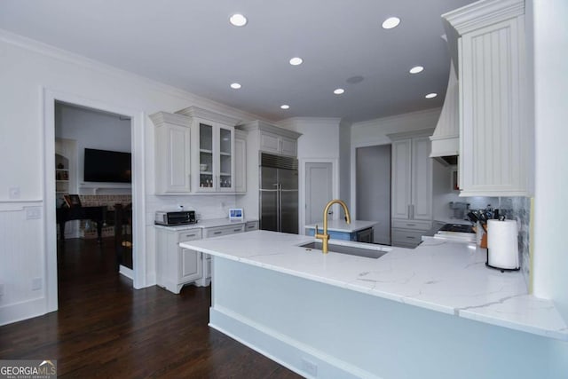 2771 Point Overlook, Gainesville, GA 30501 - kitchen featuring sink, white cabinetry, dark hardwood / wood-style floors, kitchen peninsula, and stainless steel built in fridge