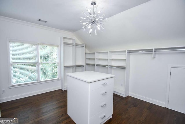 2771 Point Overlook, Gainesville, GA 30501 - walk in closet with lofted ceiling, dark hardwood / wood-style floors, and an inviting chandelier