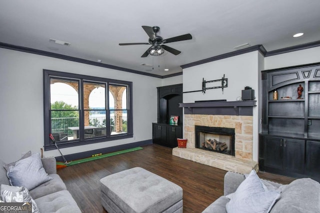 2771 Point Overlook, Gainesville, GA 30501 - living room featuring a fireplace, crown molding, dark wood-type flooring, and ceiling fan