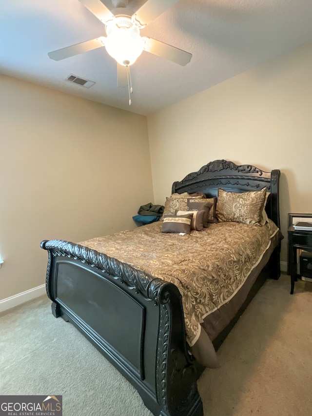 bedroom featuring carpet flooring and ceiling fan