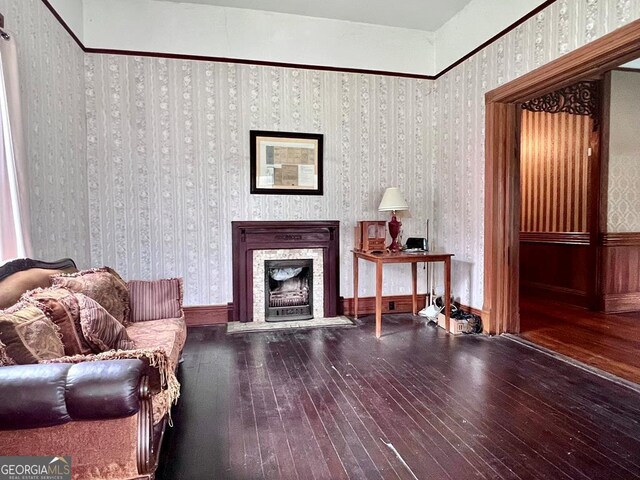 sitting room featuring hardwood / wood-style floors