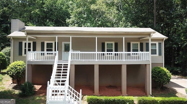 view of front of home featuring covered porch