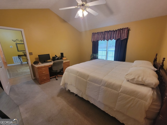 bedroom featuring ceiling fan, vaulted ceiling, and carpet