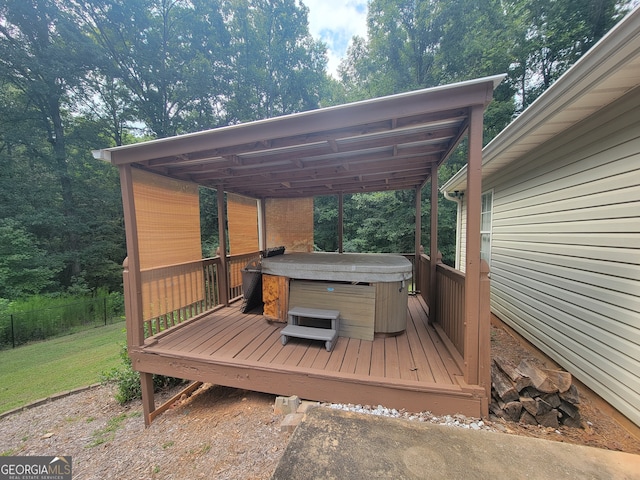 deck featuring a hot tub