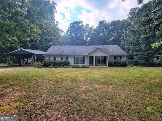 single story home with a front yard and a carport