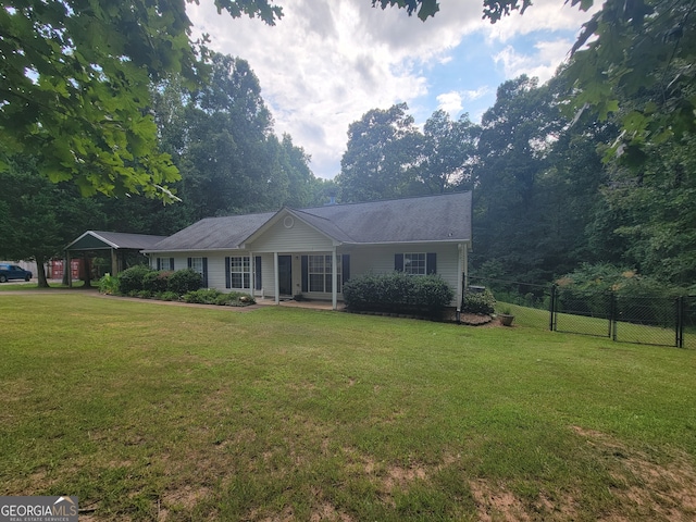 ranch-style house with a front lawn