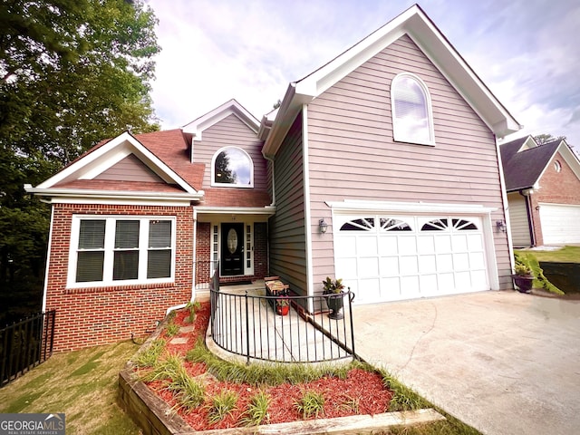 front of property with a garage