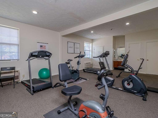 exercise area with a textured ceiling