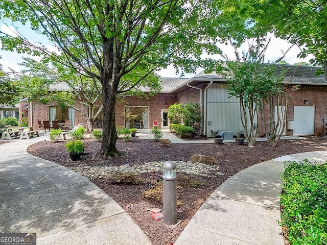 view of front of home featuring a patio area