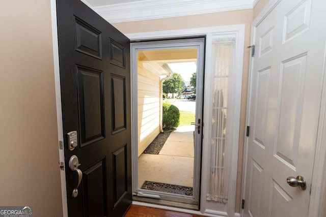 foyer entrance with ornamental molding