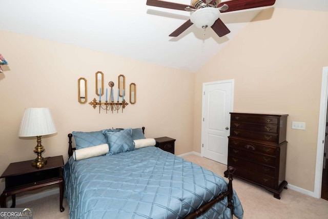 carpeted bedroom with lofted ceiling and ceiling fan