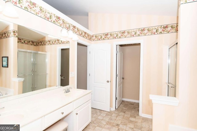 bathroom featuring vanity and walk in shower