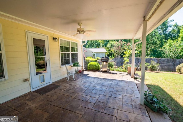 view of patio / terrace featuring ceiling fan