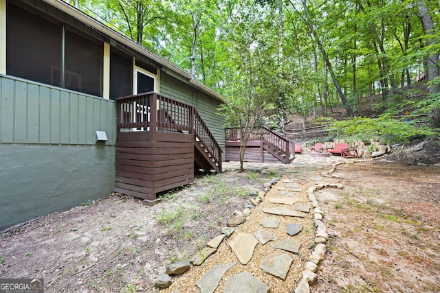 view of yard with a wooden deck