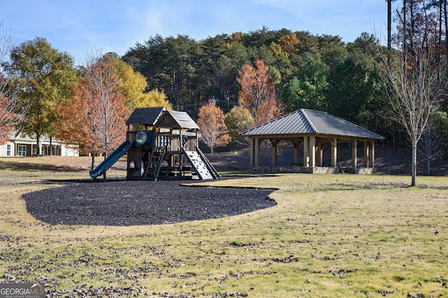 view of jungle gym with a gazebo and a lawn