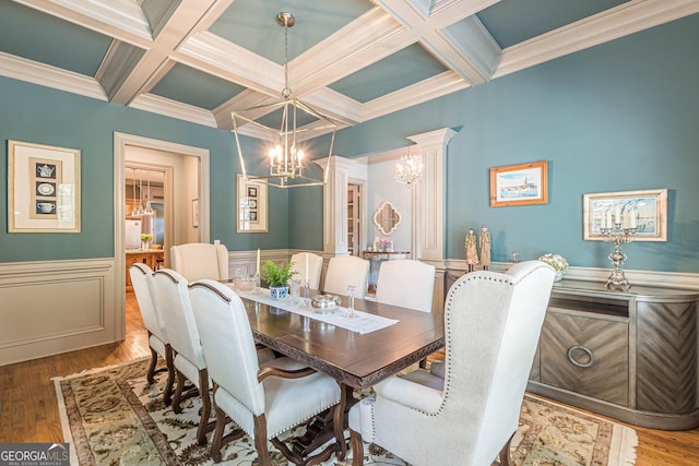 1829 Buckhead Valley Ln NE, Atlanta, GA 30324 - dining area featuring an inviting chandelier, beam ceiling, coffered ceiling, and wood finished floors