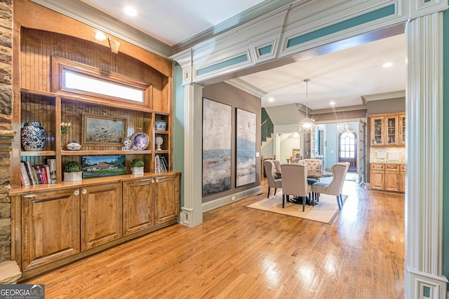 1829 Buckhead Valley Ln NE, Atlanta, GA 30324 - dining room featuring an inviting chandelier, light wood-style flooring, ornamental molding, and recessed lighting