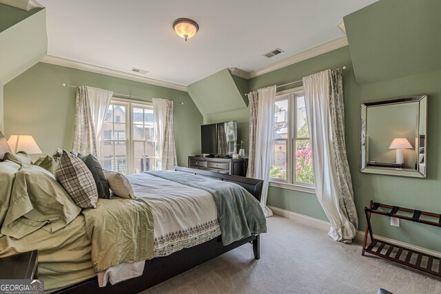 bedroom with carpet and ornamental molding