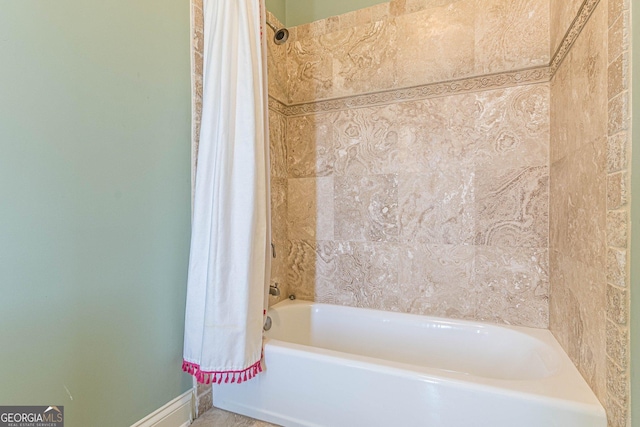 1829 Buckhead Valley Ln NE, Atlanta, GA 30324 - bathroom featuring shower / bath combo and baseboards