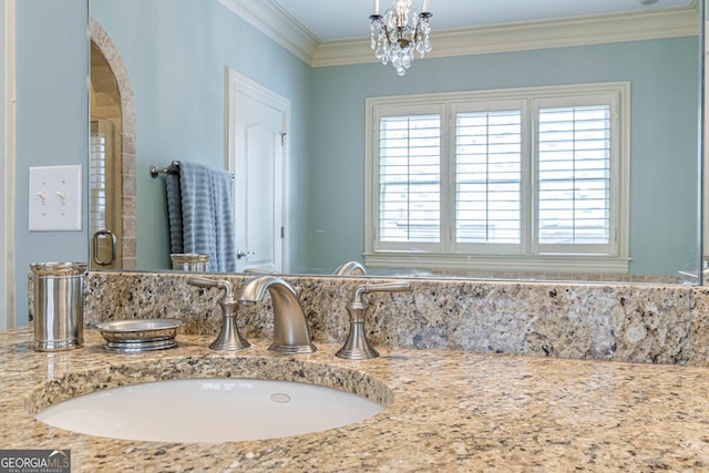 1829 Buckhead Valley Ln NE, Atlanta, GA 30324 - bathroom with double vanity, ornamental molding, a sink, and a chandelier