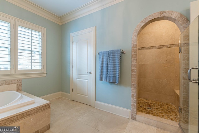 1829 Buckhead Valley Ln NE, Atlanta, GA 30324 - bathroom featuring tile patterned floors, crown molding, a garden tub, a shower stall, and baseboards