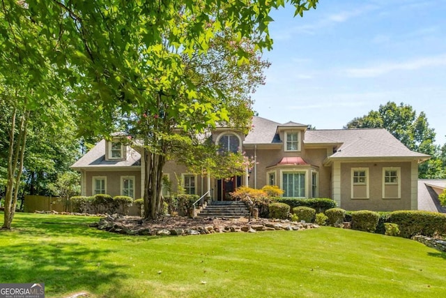 view of front of house with a front lawn