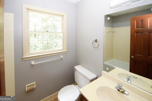 bathroom featuring a shower, vanity, toilet, and a bath