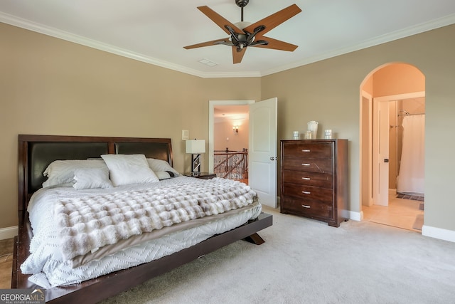 bedroom featuring ceiling fan, light carpet, and crown molding