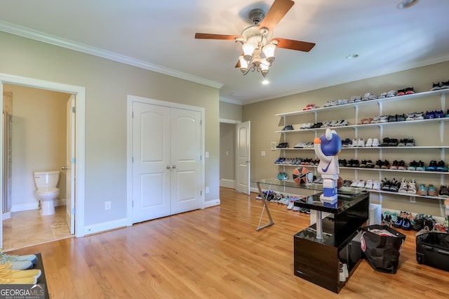 tiled office featuring ceiling fan and crown molding