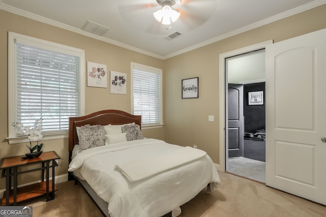 carpeted bedroom with ceiling fan, multiple windows, and ornamental molding