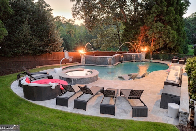 view of pool with an outdoor hangout area, a patio area, pool water feature, and a jacuzzi