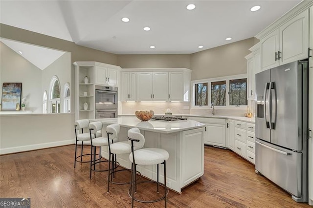 kitchen featuring white cabinetry, a center island, and stainless steel appliances