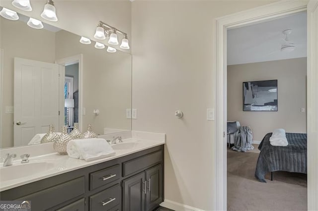 bathroom featuring vanity and ceiling fan