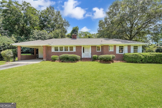 ranch-style home featuring a carport and a front yard