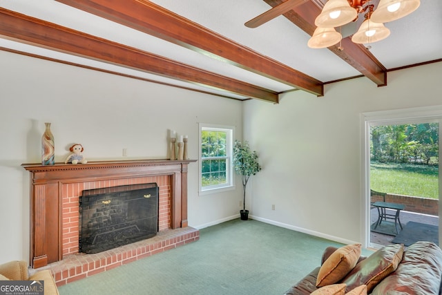 carpeted living room featuring beam ceiling, ceiling fan, and a fireplace