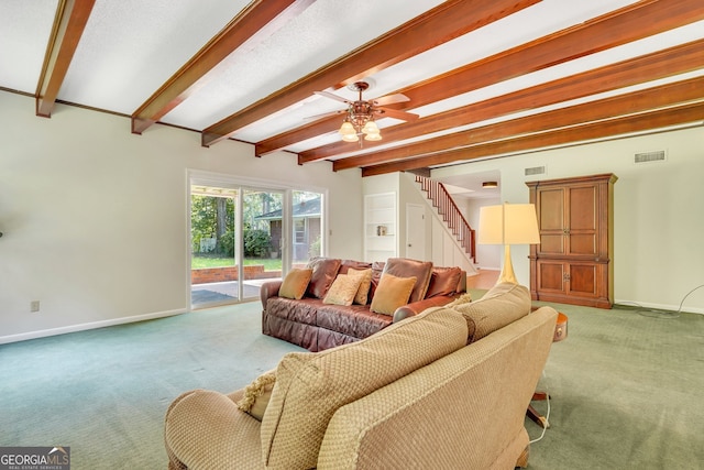 carpeted living room with beam ceiling and ceiling fan