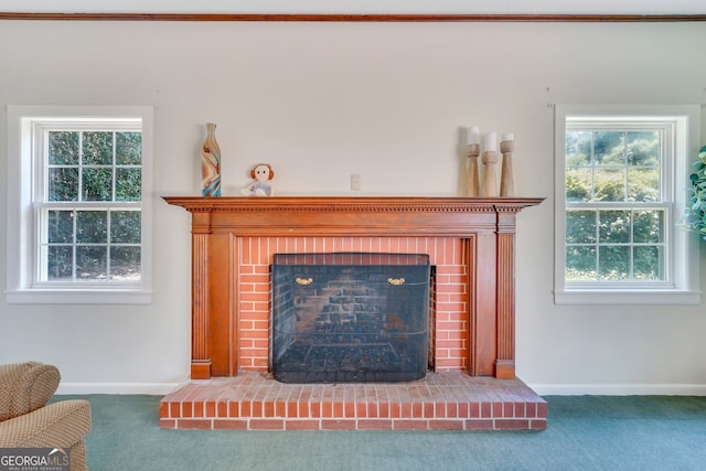 carpeted living room featuring a brick fireplace