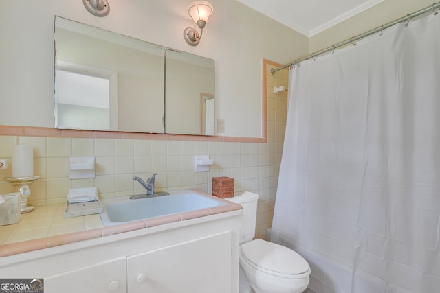 bathroom featuring decorative backsplash, toilet, vanity, and tile walls