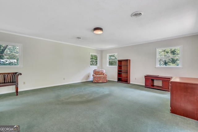 unfurnished room with crown molding and dark colored carpet