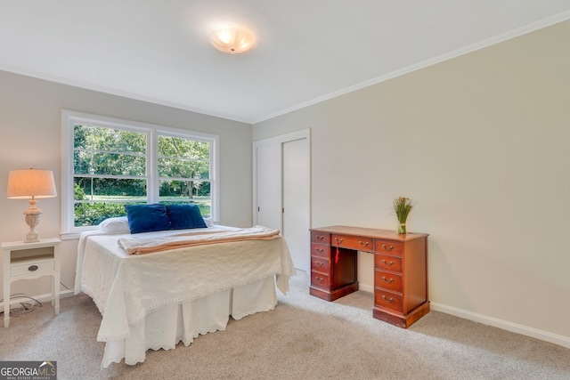 carpeted bedroom featuring ornamental molding