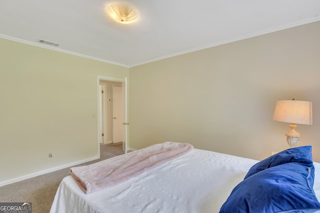 bedroom featuring carpet flooring and crown molding