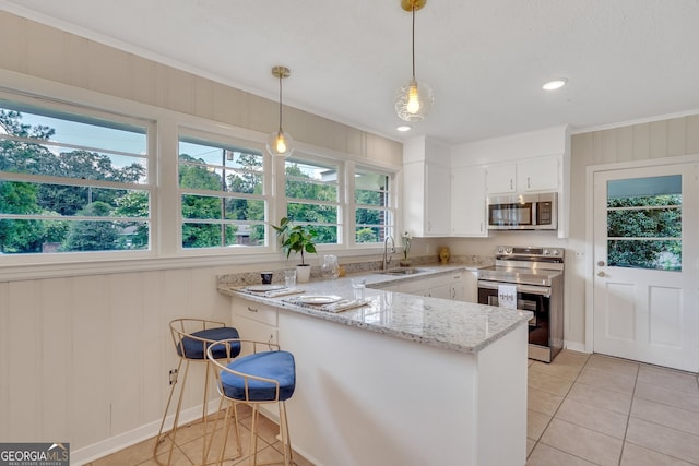 kitchen with white cabinets, sink, electric stove, and kitchen peninsula