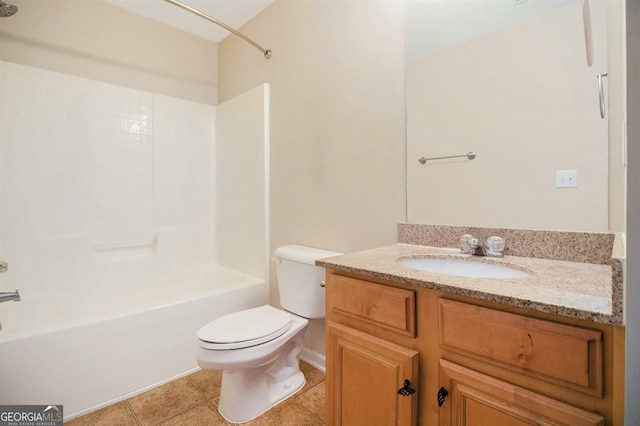 full bath with shower / bath combination, vanity, toilet, and tile patterned floors