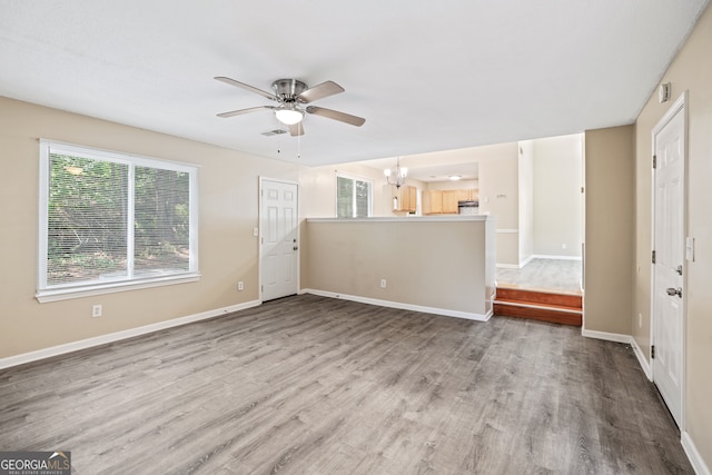 interior space featuring ceiling fan and hardwood / wood-style floors