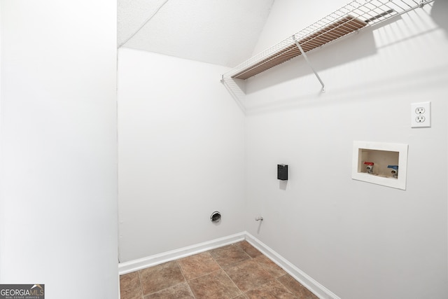 washroom featuring tile patterned floors, electric dryer hookup, gas dryer hookup, and hookup for a washing machine