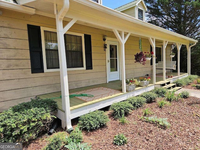 property entrance with a porch