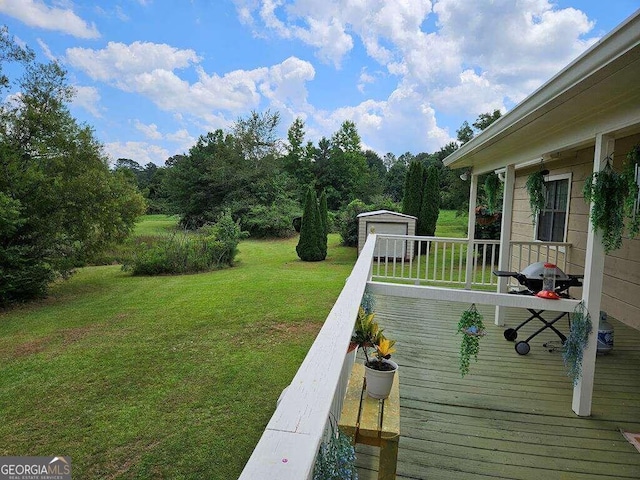 deck featuring a yard