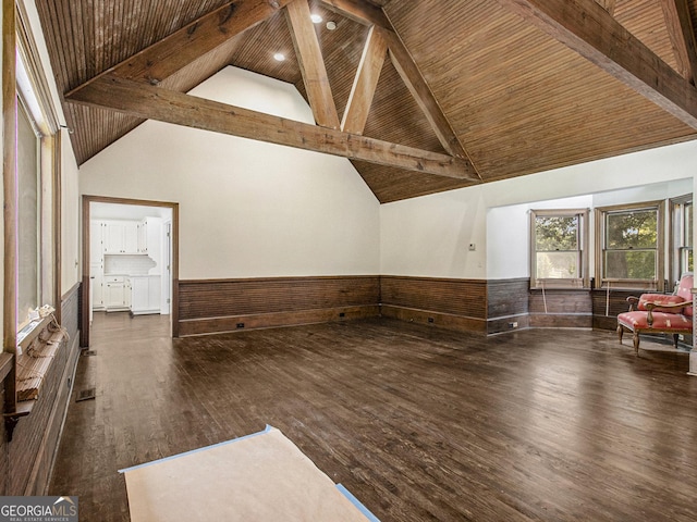 bonus room with beam ceiling, dark hardwood / wood-style floors, high vaulted ceiling, and wood ceiling