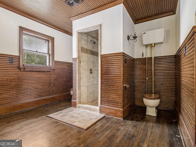 bathroom featuring ornamental molding, wood-type flooring, wooden ceiling, and toilet